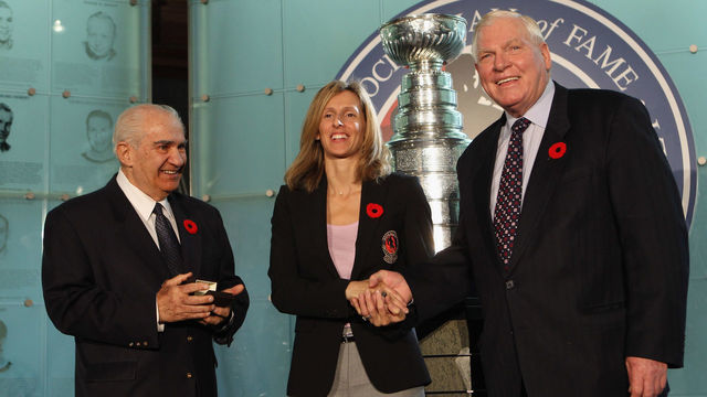 TORONTO, ON - NOVEMBER 08: Cammi Granato (C) is presented with her Hall of Fame ring by Jim Gregory (L) and Don Hay (R) at a media opportunity prior to her induction ceremony at the Hockey Hall of Fame on November 8, 2010 in Toronto, Canada.