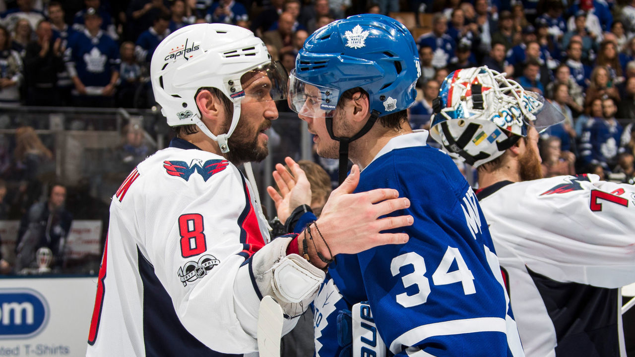 TORONTO, ON - APRIL 23: Auston Matthews #34 of the Toronto Maple Leafs congratulates Alex Ovechkin #8 of the Washington Capitals after the Capitals defeated the Leafs during overtime in Game Six of the Eastern Conference First Round during the 2017 NHL Stanley Cup Playoffs at the Air Canada Centre on April 23, 2017 in Toronto, Ontario, Canada.