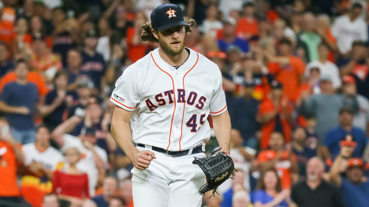 HOUSTON, TX - SEPTEMBER 18: Houston Astros starting pitcher Gerrit Cole (45) reacts after throwing his 300th strikeout in the top of the sixth inning during the baseball game between the Texas Rangers and Houston Astros at Minute Maid Park on September 18, 2019 in Houston, Texas.
