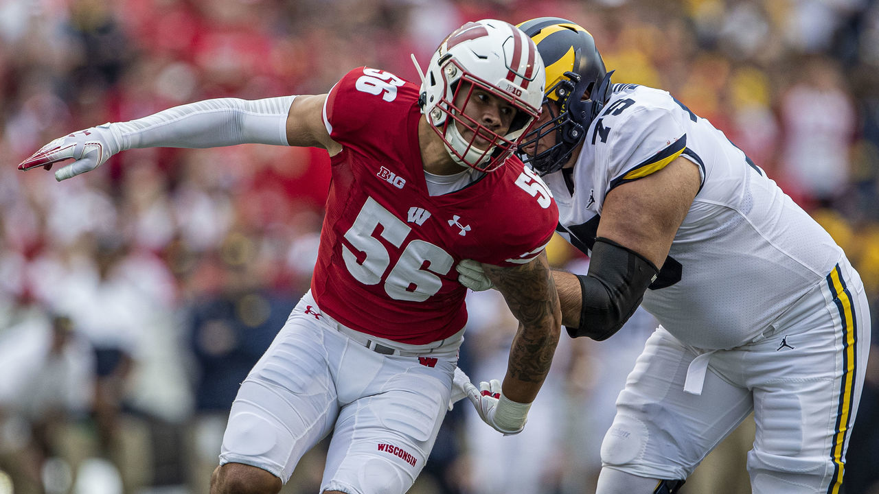MADISON, WI - SEPTEMBER 21: Wisconsin Badgers outside linebacker Zack Baun (56) gets around the edge of Michigan Wolverines offensive lineman Jon Runyan (75) durning a college football game between the Michigan Wolverines and the Wisconsin Badgers on September 21, 2019, at Camp Randall Stadium in Madison, WI.