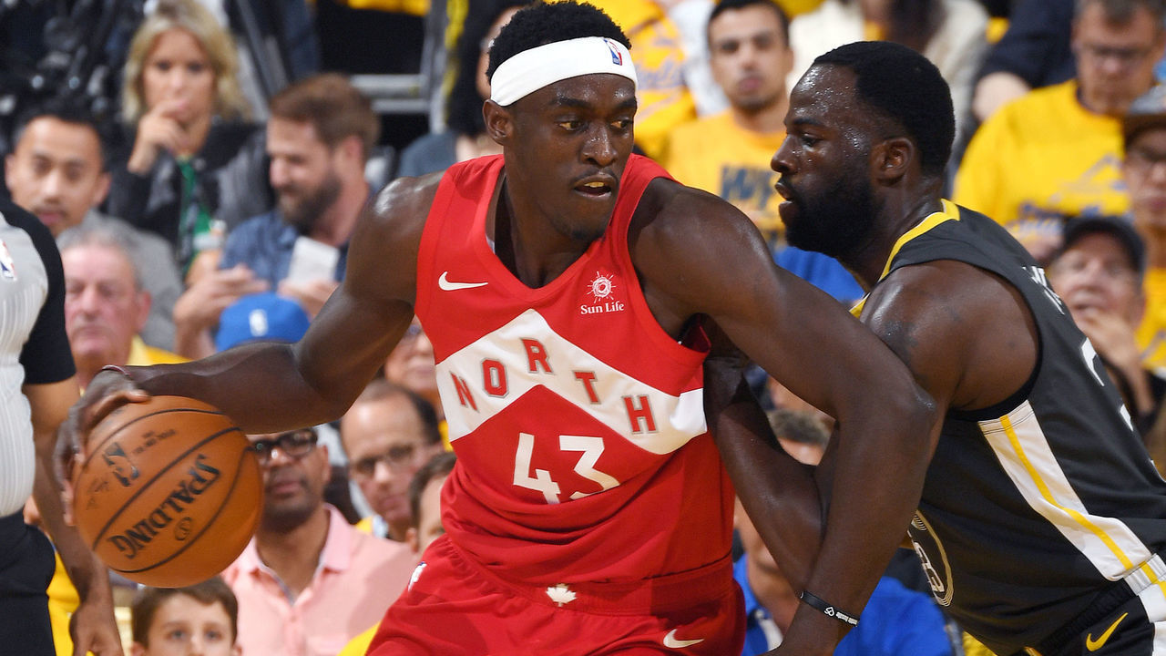 OAKLAND, CA - JUNE 13: Pascal Siakam #43 of the Toronto Raptors handles the ball against Draymond Green #23 of the Golden State Warriors during Game Six of the NBA Finals on June 13, 2019 at ORACLE Arena in Oakland, California. NOTE TO USER: User expressly acknowledges and agrees that, by downloading and/or using this photograph, user is consenting to the terms and conditions of Getty Images License Agreement. Mandatory Copyright Notice: Copyright 2019 NBAE