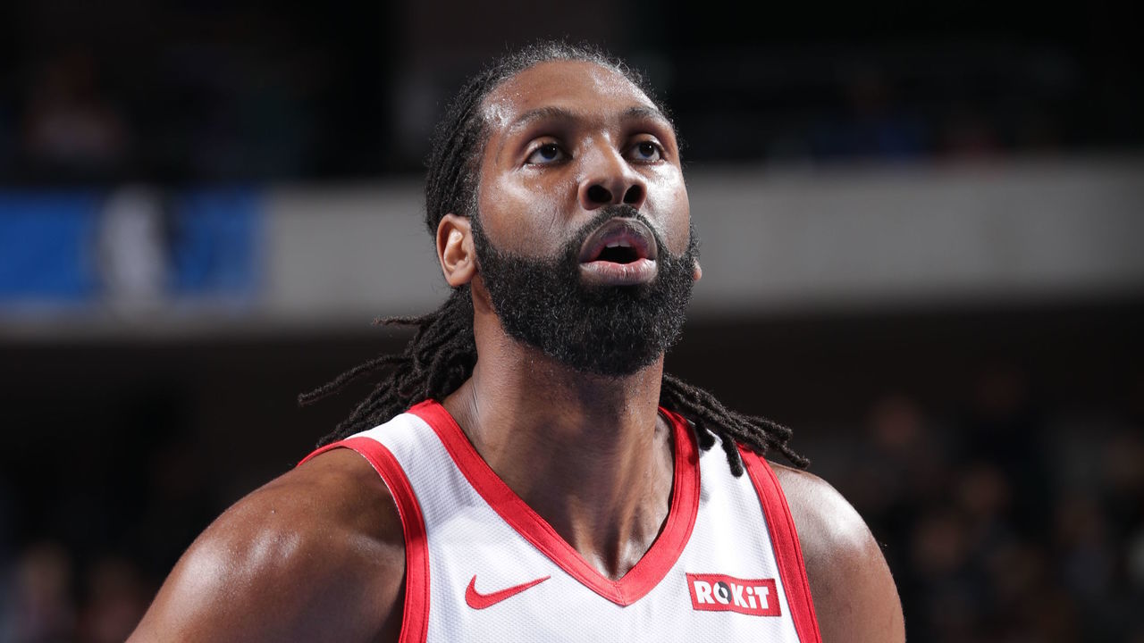 DALLAS, TX - MARCH 10: Nene Hilario #42 of the Houston Rockets shoots a free throw against the Dallas Mavericks on March 10, 2019 at the American Airlines Center in Dallas, Texas. Mandatory Copyright Notice: Copyright 2019 NBAE