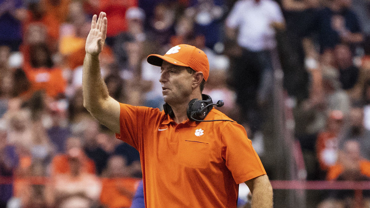 SYRACUSE, NY - SEPTEMBER 14: Clemson Tigers Head Coach Dabo Swinney signals to his players on the field during the second half of the game between the Clemson Tigers and the Syracuse Orange on September 14, 2019, at the Carrier Dome in Syracuse, NY.