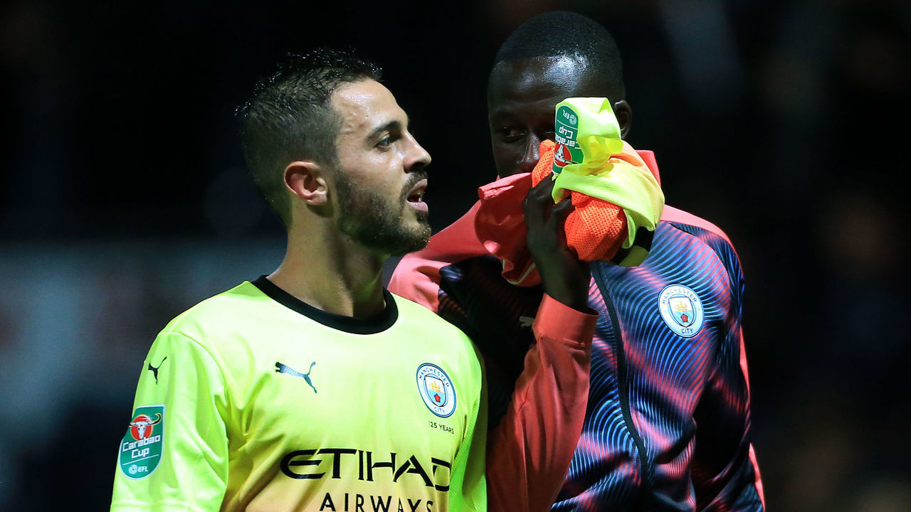 PRESTON, ENGLAND - SEPTEMBER 24: Bernardo Silva of Man City walks off at half-time alongside Benjamin Mendy of Man City during the Carabao Cup Third Round match between Preston North End and Manchester City at Deepdale on September 24, 2019 in Preston, England.