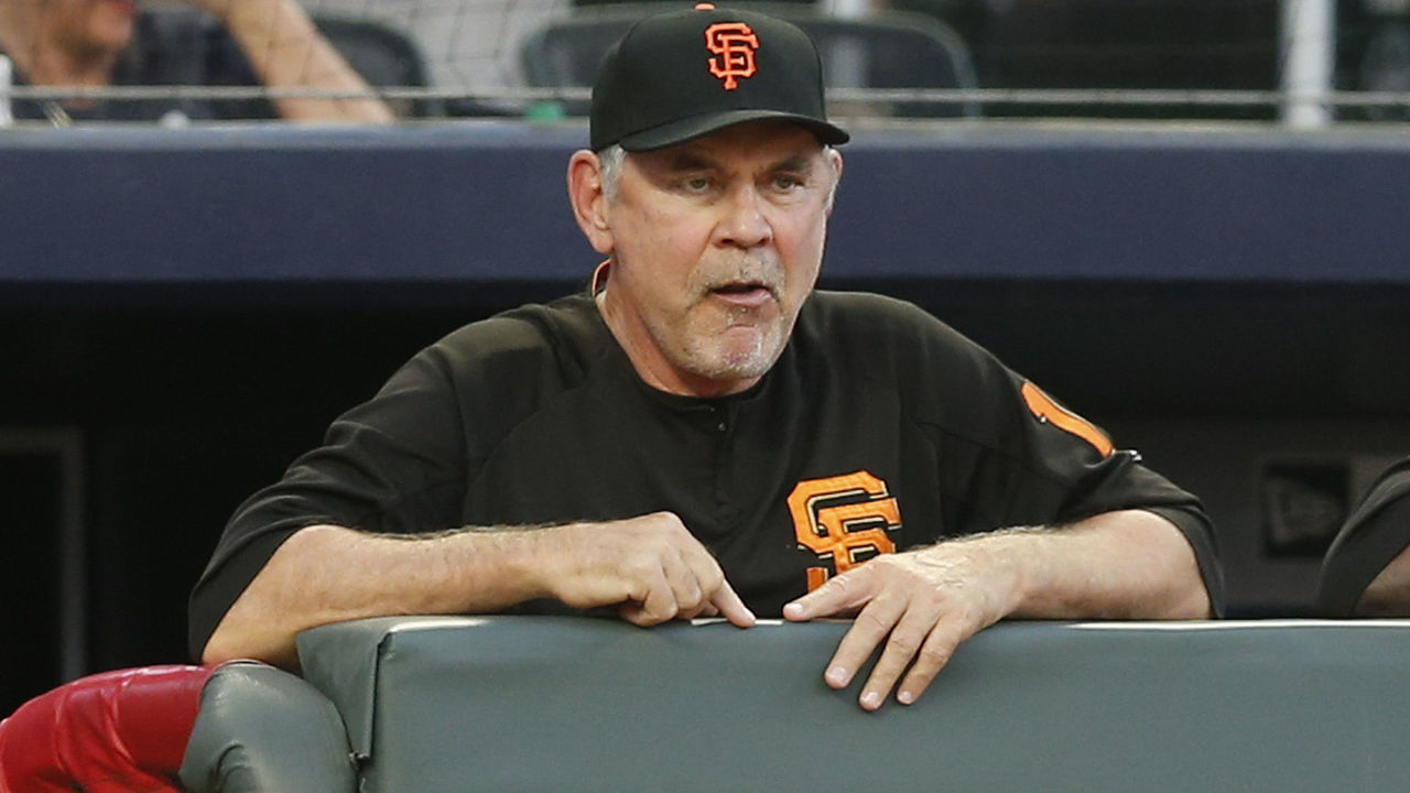 ATLANTA, GEORGIA - SEPTEMBER 21: Manager Bruce Bochy #15 of the San Francisco Giants watches action on the field in the first inning during the game against the Atlanta Braves at SunTrust Park on September 21, 2019 in Atlanta, Georgia.