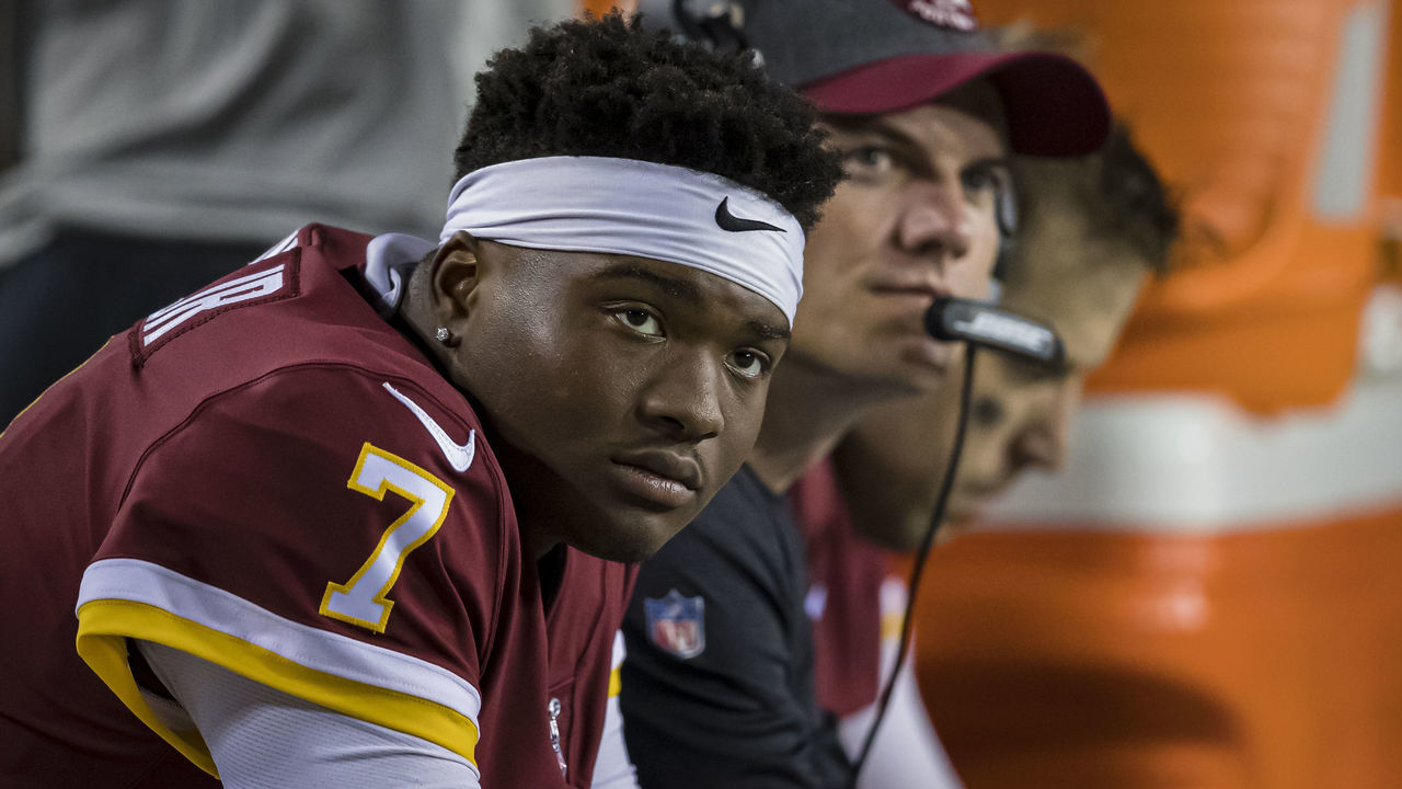 LANDOVER, MD - SEPTEMBER 23: Dwayne Haskins #7 of the Washington Redskins looks on while sitting on the bench next to offensive coordinator Kevin OConnell and Case Keenum #8 against the Chicago Bears during the second half at FedExField on September 23, 2019 in Landover, Maryland.