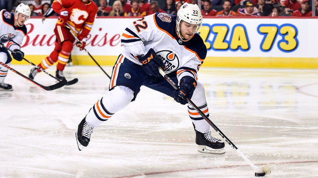 CALGARY, AB - APRIL 06: Edmonton Oilers Left Wing Tobias Rieder (22) stickhandles into the Calgary Flames zone during the second period of an NHL game where the Calgary Flames hosted the Edmonton Oilers on April 6, 2019, at the Scotiabank Saddledome in Calgary, AB.
