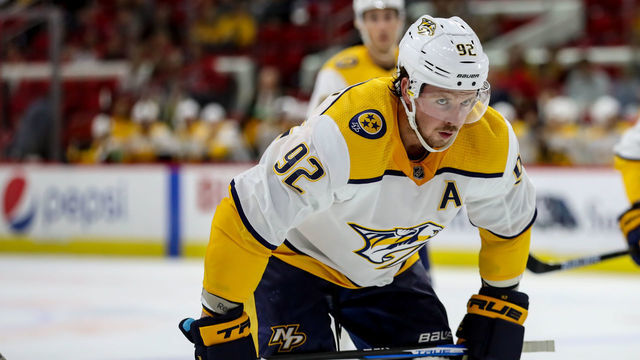 RALEIGH, NC - SEPTEMBER 27: Nashville Predators center Ryan Johansen (92) eyes up his opponent during an NHL Pre-Season game between the Carolina Hurricanes and the Nashville Predators on September 27, 2019 at the PNC Arena in Raleigh, NC.
