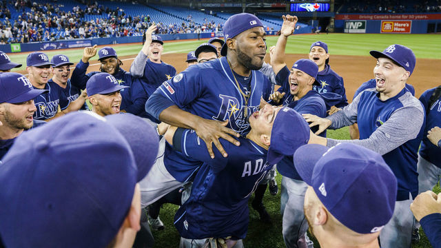 TORONTO, ONTARIO - SEPTEMBER 27: Tampa Bay Rays players celebrate clinching a wild card playoff spot after defeating the Toronto Blue Jays in their MLB game at the Rogers Centre on September 27, 2019 in Toronto, Canada.
