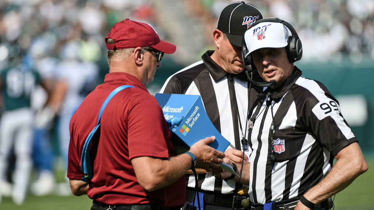 PHILADELPHIA, PA - SEPTEMBER 22: Referee Tony Corrente (99) and back judge Todd Prukop (30) review a play on the Microsoft Surface during the game between the Detroit Lions and the Philadelphia Eagles on September 22, 2019 at Lincoln Financial Field in Philadelphia, PA.