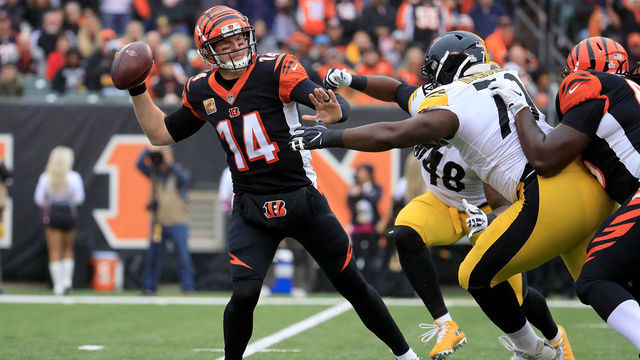CINCINNATI, OH - OCTOBER 14: Javon Hargrave #79 of the Pittsburgh Steelers pressures Andy Dalton #14 of the Cincinnati Bengals during the first quarter at Paul Brown Stadium on October 14, 2018 in Cincinnati, Ohio.