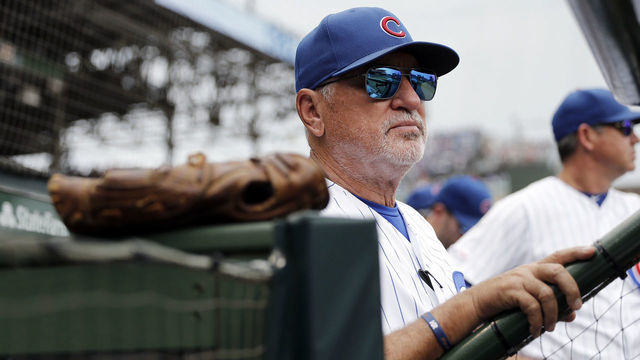 CHICAGO, ILLINOIS - SEPTEMBER 21: Manager Joe Maddon #70 of the Chicago Cubs stands in the dugout during the game against the St. Louis Cardinals at Wrigley Field on September 21, 2019 in Chicago, Illinois.