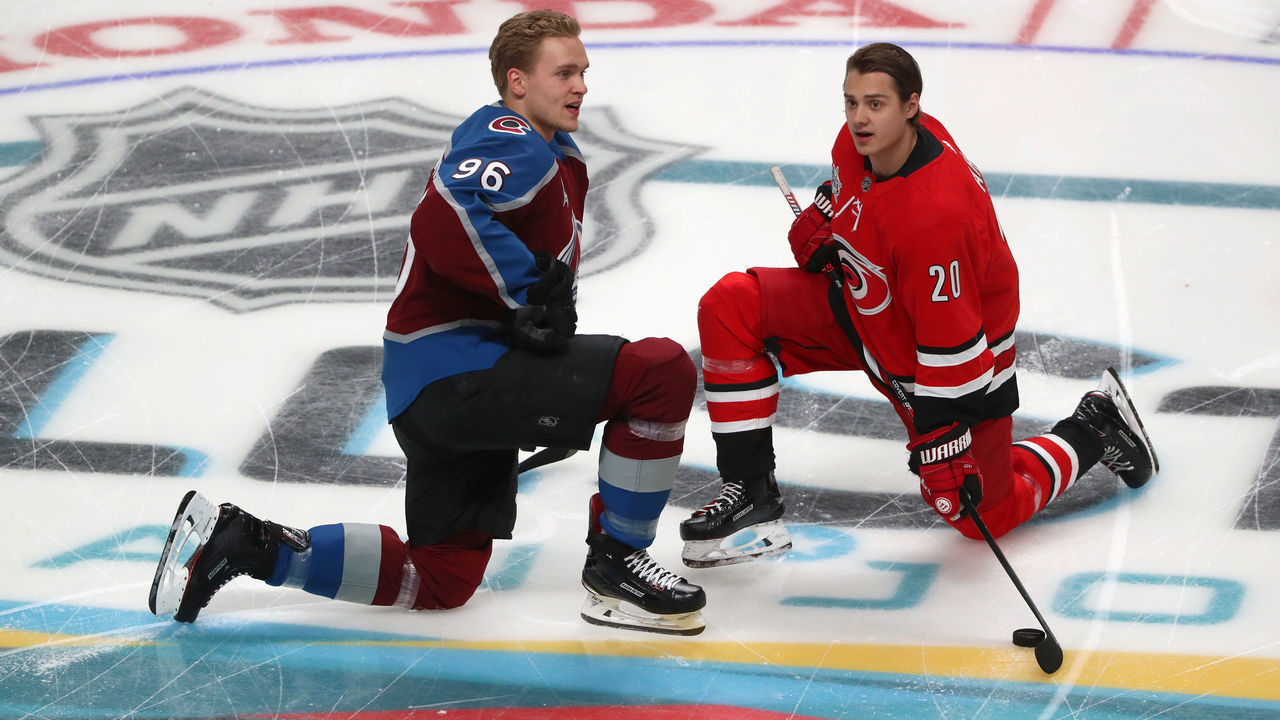 SAN JOSE, CA - JANUARY 25: Mikko Rantanen #96 of the Colorado Avalanche and Sebastian Aho #20 of the Carolina Hurricanes stretch during warm-up prior to the 2019 SAP NHL All-Star Skills at SAP Center on January 25, 2019 in San Jose, California.