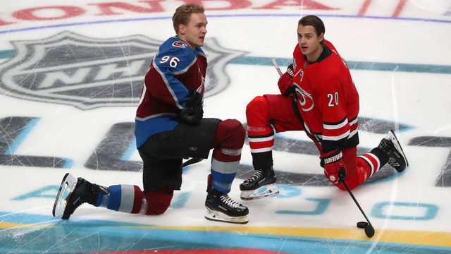 SAN JOSE, CA - JANUARY 25: Mikko Rantanen #96 of the Colorado Avalanche and Sebastian Aho #20 of the Carolina Hurricanes stretch during warm-up prior to the 2019 SAP NHL All-Star Skills at SAP Center on January 25, 2019 in San Jose, California.