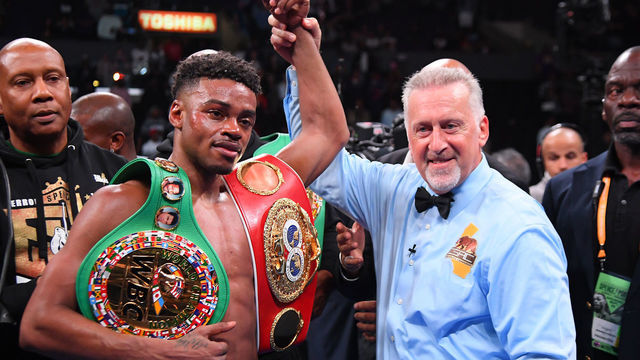 LOS ANGELES, CA - SEPTEMBER 28: Referee Jack Reiss in in the ring with Erroll Spence Jr. after he defeated Shawn Porter (not pictured) in their IBF & WBC World Welterweight Championship fight at Staples Center on September 28, 2019 in Los Angeles, California. Spence, Jr won by decision.
