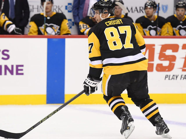 PITTSBURGH, PA - SEPTEMBER 25: Pittsburgh Penguins center Sidney Crosby (87) skates with the puck during the second period in the NHL game between the Pittsburgh Penguins and the Detroit Red Wings on September 25, 2019, at PPG Paints Arena in Pittsburgh, PA.