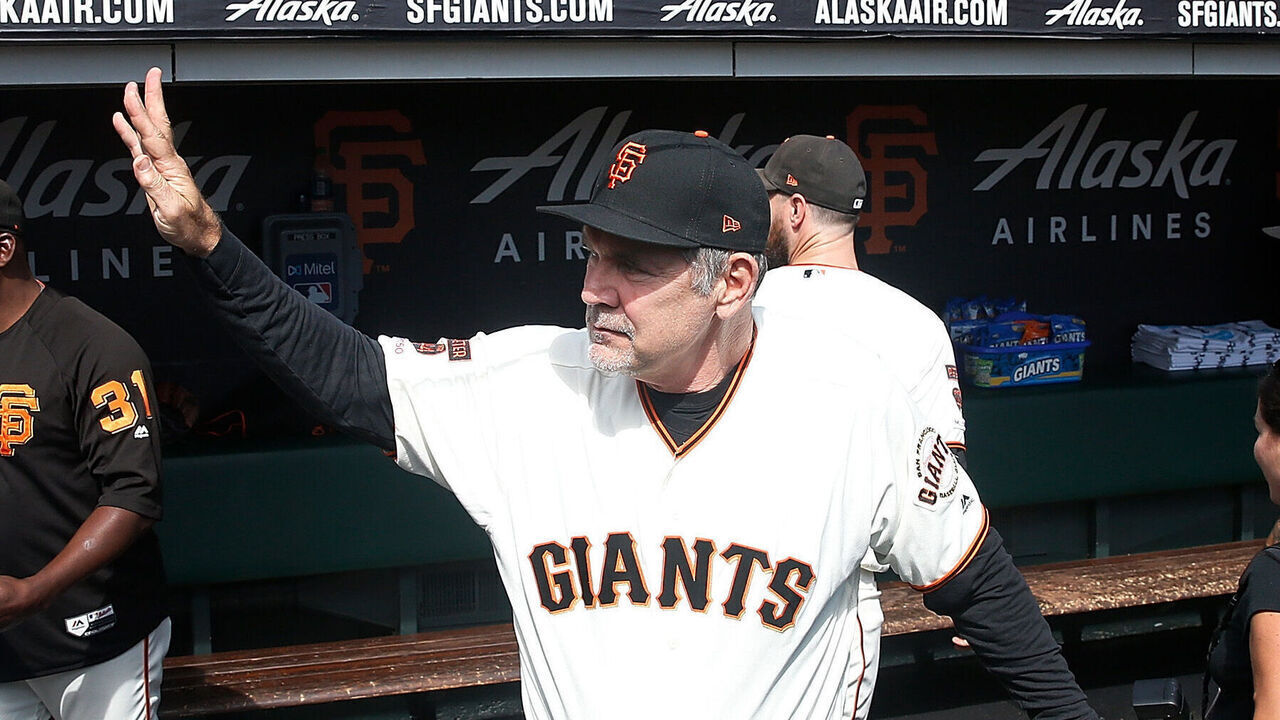 SAN FRANCISCO, CALIFORNIA - SEPTEMBER 29: Manager Bruce Bochy #15 of the San Francisco Giants acknowledges the fans as he walks into the dugout before his last game as Giants manager, the game against the Los Angeles Dodgers at Oracle Park on September 29, 2019 in San Francisco, California.