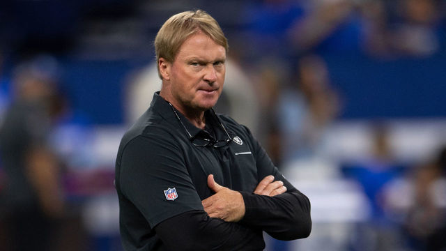 INDIANAPOLIS, IN - SEPTEMBER 29: Oakland Raiders head coach Jon Gruden watches players warm up before the NFL game between the Oakland Raiders and the Indianapolis Colts on September 29, 2019 at Lucas Oil Stadium, in Indianapolis, IN.