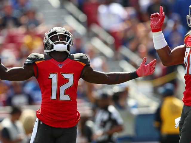 LOS ANGELES, CALIFORNIA - SEPTEMBER 29: Chris Godwin #12 of the Tampa Bay Buccaneers celebrates his run with O.J. Howard #80 of the Tampa Bay Buccaneers in the first quarter against the Los Angeles Rams at Los Angeles Memorial Coliseum on September 29, 2019 in Los Angeles, California.