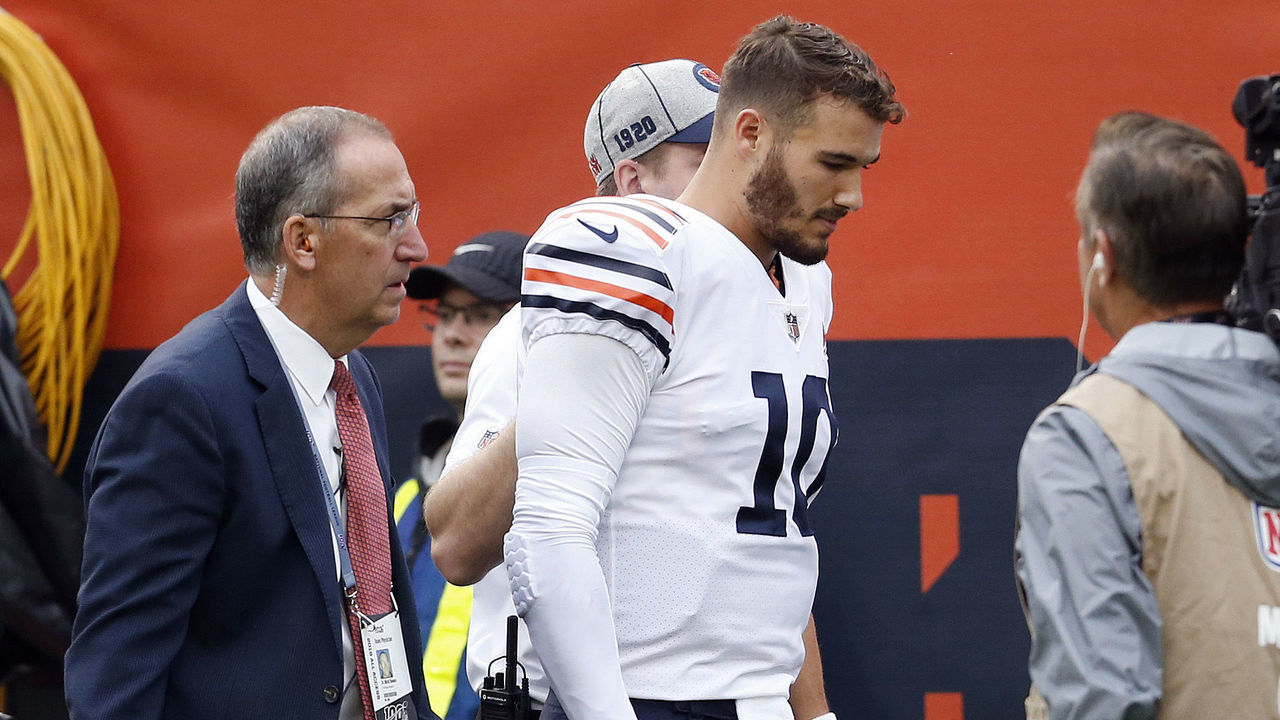 CHICAGO, ILLINOIS - SEPTEMBER 29: Mitchell Trubisky #10 of the Chicago Bears is escorted to the locker room by a team doctor following an injury during the first quarter against the Minnesota Vikings Soldier Field on September 29, 2019 in Chicago, Illinois.