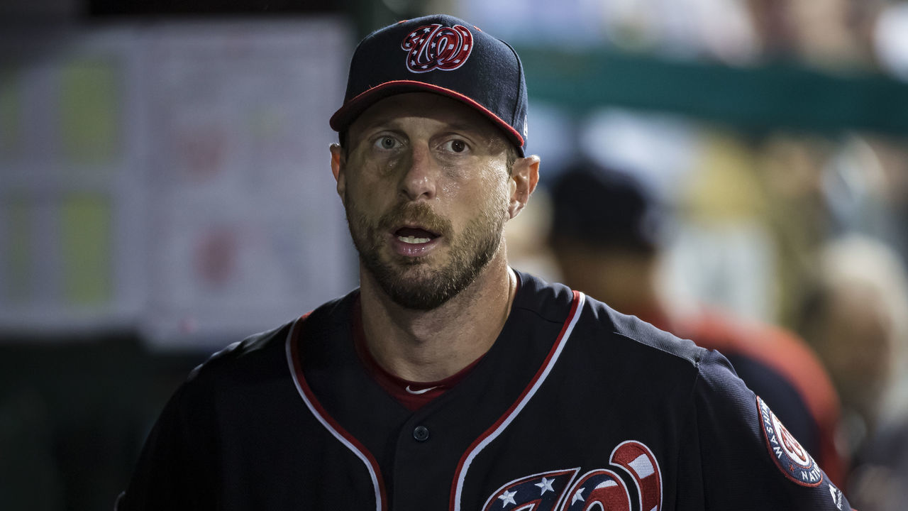 WASHINGTON, DC - SEPTEMBER 13: Max Scherzer #31 of the Washington Nationals walks in the dugout after pitching against the Atlanta Braves during the fifth inning at Nationals Park on September 13, 2019 in Washington, DC.