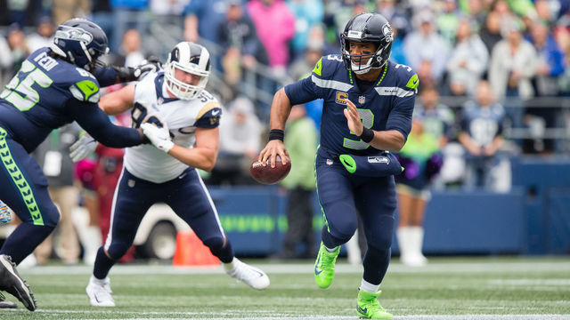SEATTLE, WA - OCTOBER 7: Quarterback Russell Wilson (3) of the Seattle Seahawks scrambles in the first quarter during a game between the Los Angeles Rams and the Seattle Seahawks on October 7, 2018 at CenturyLink Field in Seattle, WA. The Los Angeles Rams defeated the Seattle Seahawks by a final score of 33-31.