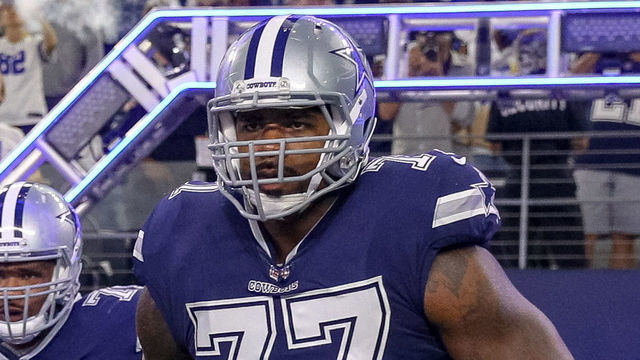 ARLINGTON, TX - NOVEMBER 05: Dallas Cowboys head coach Jason Garrett, offensive tackle La'el Collins (71) and offensive tackle Tyron Smith (77) lead the team out of the tunnel prior to the game between the Tennessee Titans and Dallas Cowboys on November 5, 2018 at AT&T Stadium in Arlington, TX.