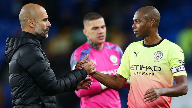 LIVERPOOL, ENGLAND - SEPTEMBER 28: Pep Guardiola, manager of Manchester City shakes hands with Fernandinho during the Premier League match between Everton FC and Manchester City at Goodison Park on September 28, 2019 in Liverpool, United Kingdom.