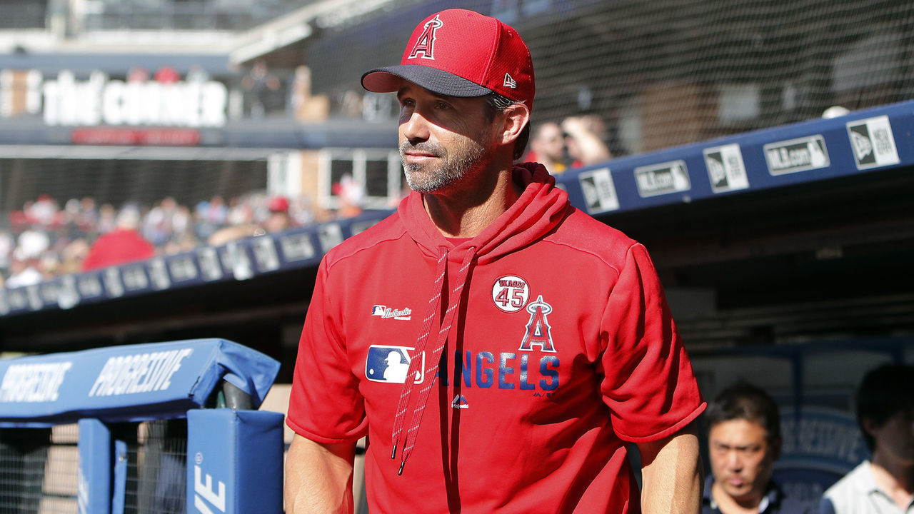 CLEVELAND, OH - AUGUST 03: Manager Brad Ausmus #12 of the Los Angeles Angels of Anaheim walks from the dugout before the game against the Cleveland Indians at Progressive Field on August 3, 2019 in Cleveland, Ohio. The Indians defeated the Angels 7-2.
