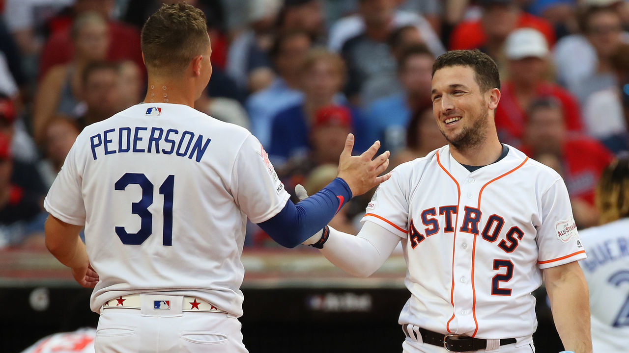 CLEVELAND, OHIO - JULY 08: Alex Bregman of the Houston Astros hugs Joc Pederson of the Los Angeles Dodgers during the T-Mobile Home Run Derby at Progressive Field on July 08, 2019 in Cleveland, Ohio.