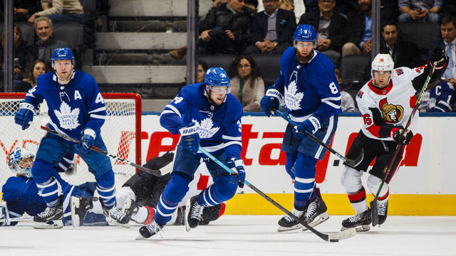 TORONTO, ON - FEBRUARY 6: Auston Matthews #34 of the Toronto Maple Leafs skates against Colin White #36 of the Ottawa Senators during the third period at the Scotiabank Arena on February 6, 2019 in Toronto, Ontario, Canada.