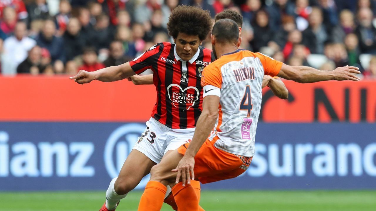 Nice's French forward Lamine Diaby-Fadiga and Montpellier's Brazilian defender Vitorino Hilton fight for the ball during the French L1 football match between Nice and Montpellier on April 7, 2019 at the "Allianz Riviera" stadium in Nice, southeastern France.