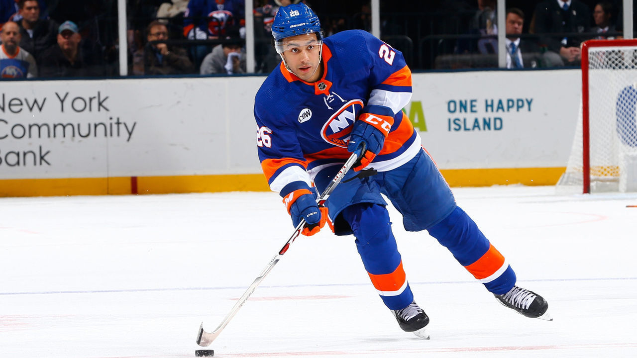 UNIONDALE, NY - JANUARY 03: Joshua Ho-Sang #26 of the New York Islanders skates agaknst the Chicago Blackhawks at Nassau Veterans Memorial Coliseum on January 3, 2019 in Uniondale, New York. New York Islanders defeated the Chicago Blackhawks 4-3 in overtime.