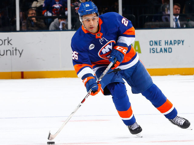 UNIONDALE, NY - JANUARY 03: Joshua Ho-Sang #26 of the New York Islanders skates agaknst the Chicago Blackhawks at Nassau Veterans Memorial Coliseum on January 3, 2019 in Uniondale, New York. New York Islanders defeated the Chicago Blackhawks 4-3 in overtime.