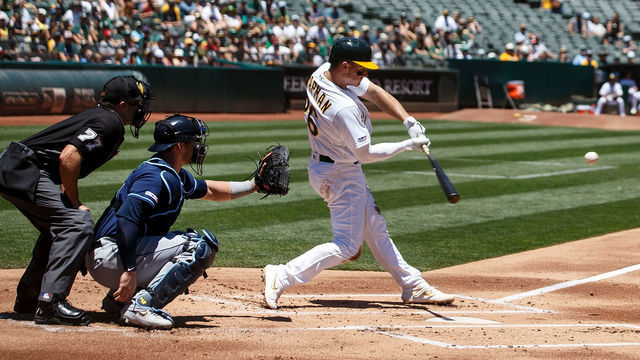 OAKLAND, CA - JUNE 23: Matt Chapman #26 of the Oakland Athletics at bat against the Tampa Bay Rays during the first inning at the RingCentral Coliseum on June 23, 2019 in Oakland, California. The Tampa Bay Rays defeated the Oakland Athletics 8-2.