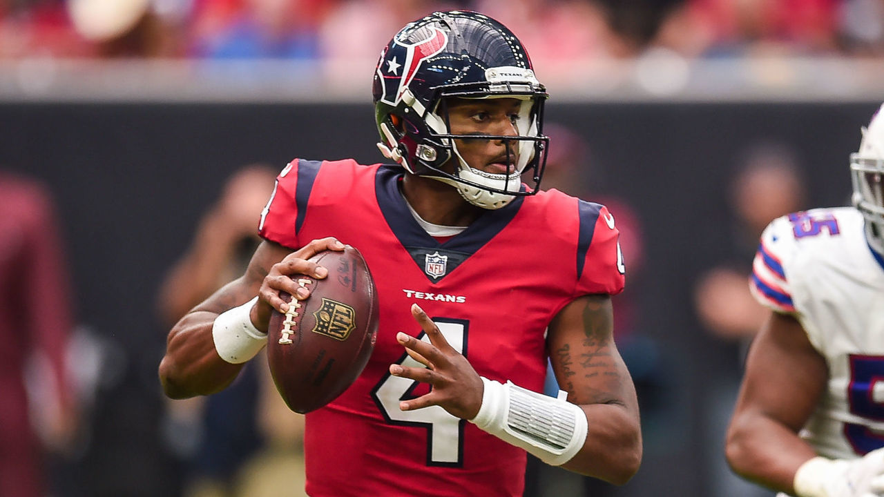 HOUSTON, TX - OCTOBER 14: Houston Texans quarterback Deshaun Watson (4) looks down the field while Buffalo Bills defensive end Jerry Hughes (55) zeroes in on him during the football game between the Buffalo Bills and Houston Texans on October 14, 2018 at NRG Stadium in Houston, Texas. The Texans beat the Bills 20-13.