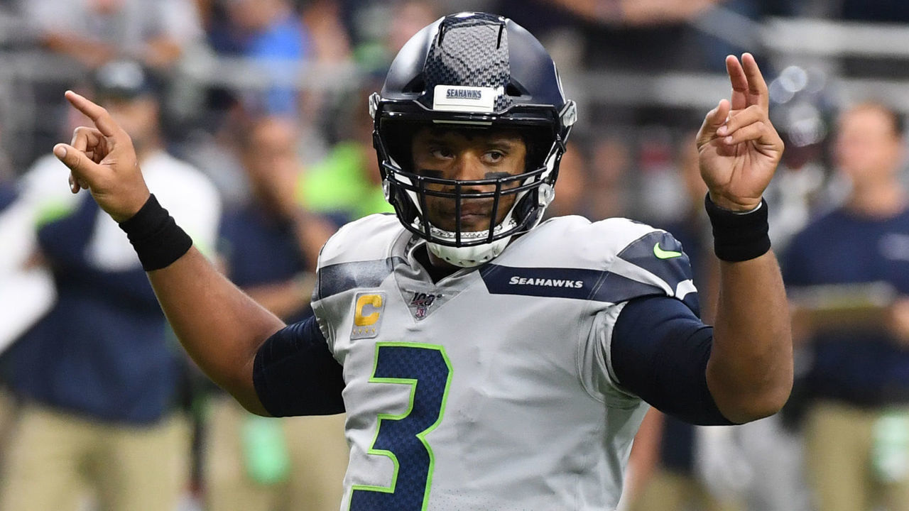 GLENDALE, ARIZONA - SEPTEMBER 29: Russell Wilson #3 of the Seattle Seahawks gestures to his receivers during a game against the Arizona Cardinals at State Farm Stadium on September 29, 2019 in Glendale, Arizona.