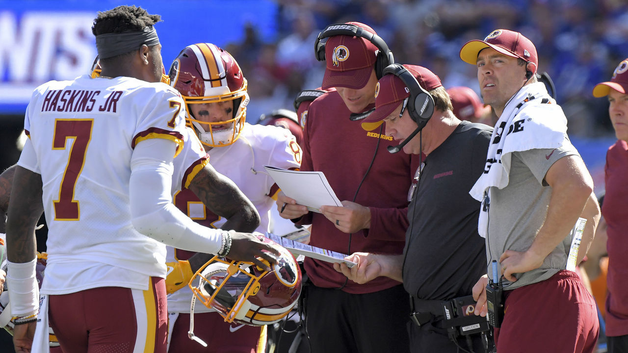 EAST RUTHERFORD, NJ - SEPTEMBER 29: Washington Redskins quarterbacks coach Tim Rattay and Washington Redskins head coach Jay Gruden go over the play during a timeout in the second quarter of the game between the Washington Redskins and the New York Giants on Sunday, September 29, 2019.