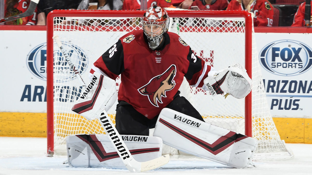GLENDALE, AZ - MARCH 26: Darcy Kuemper #35 of the Arizona Coyotes gets ready to make a save against the Chicago Blackhawks at Gila River Arena on March 26, 2019 in Glendale, Arizona.