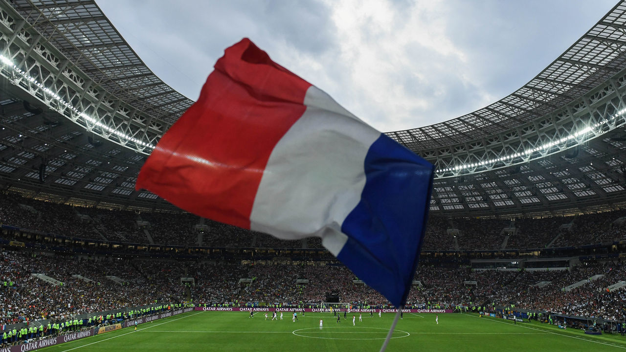 MOSCOW, RUSSIA - JULY 15: A general view inside the stadium as a France flag is flown in support during the 2018 FIFA World Cup Russia Final between France and Croatia at Luzhniki Stadium on July 15, 2018 in Moscow, Russia.
