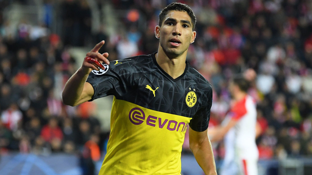 PRAGUE, CZECH REPUBLIC - OCTOBER 02: Achraf Hakimi of Borussia Dortmund celebrates after scoring his sides second goal during the UEFA Champions League group F match between Slavia Praha and Borussia Dortmund at Eden Stadium on October 02, 2019 in Prague, Czech Republic.
