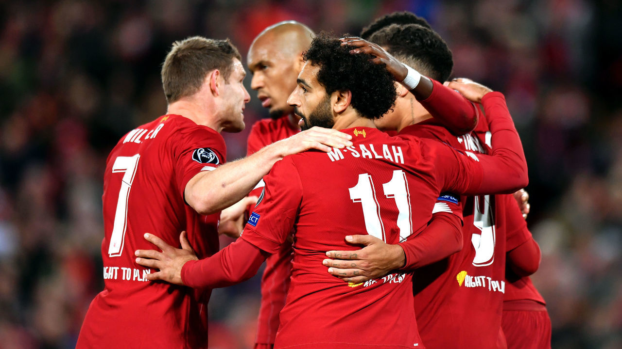 Liverpool's Mohamed Salah celebrates scoring his side's fourth goal of the game with teammates Liverpool v FC Red Bull Salzburg - UEFA Champions League - Group E - Anfield 02-10-2019 .