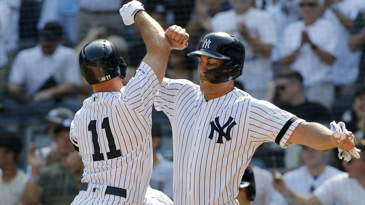 NEW YORK, NEW YORK - SEPTEMBER 22: Brett Gardner #11 of the New York Yankees celebrates his first inning three run home run against the Toronto Blue Jays with teammate Giancarlo Stanton #27 at Yankee Stadium on September 22, 2019 in New York City.