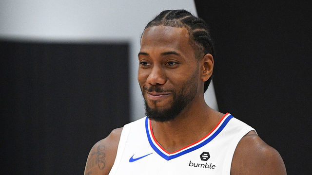 PLAYA VISTA, CA - SEPTEMBER 29: Los Angeles Clippers Forward Kawhi Leonard (2) and Los Angeles Clippers Guard Patrick Beverley (21) pose for a picture during media day at the Los Angeles Clippers Training Center on September 29, 2019 in Playa Vista, California.