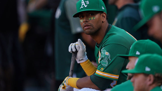OAKLAND, CALIFORNIA - OCTOBER 02: Khris Davis #2 of the Oakland Athletics looks on from the dugout during the American League Wild Card Game against the Tampa Bay Rays at RingCentral Coliseum on October 02, 2019 in Oakland, California.