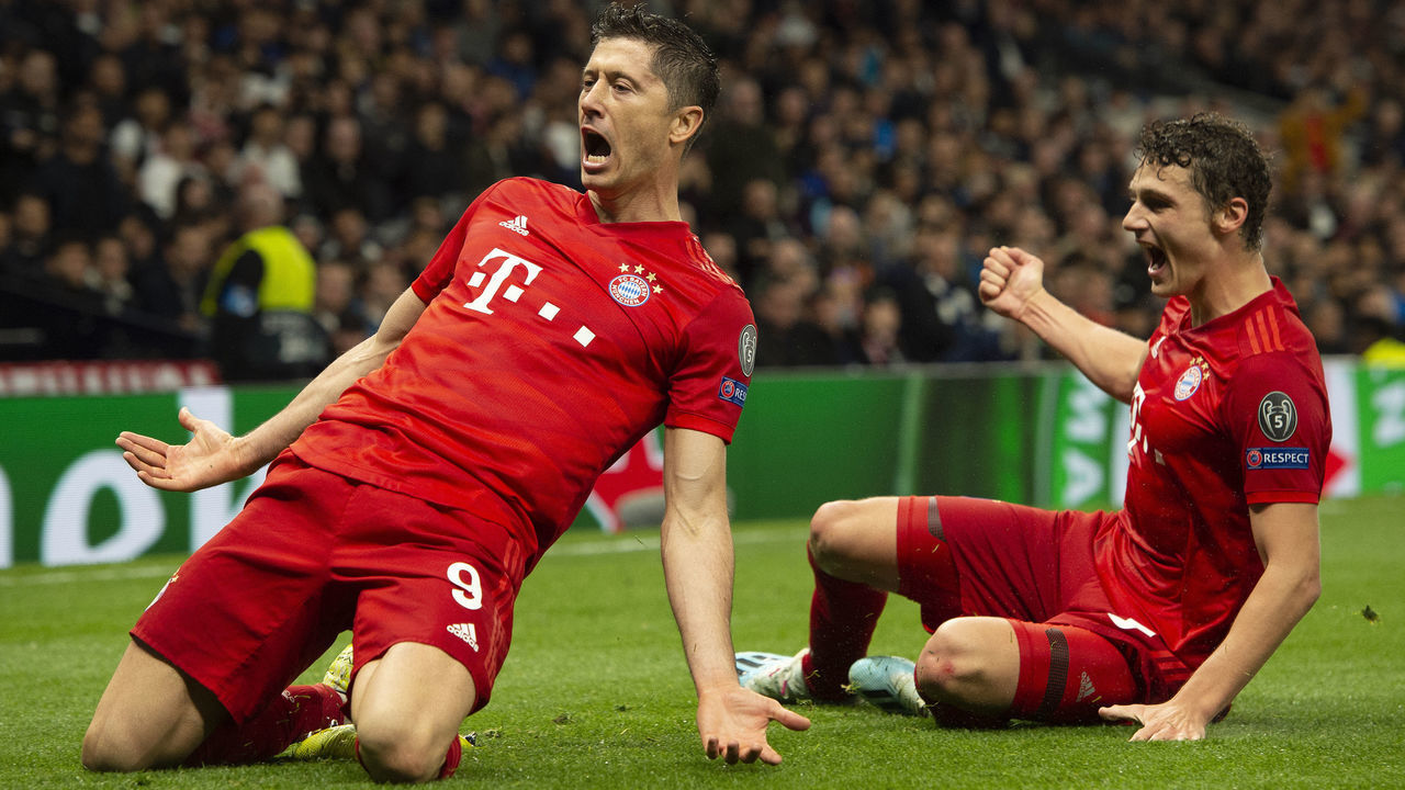 LONDON, ENGLAND - OCTOBER 01: Robert Lewandowski celebrates scoring his first and Bayern Munich's second goal with Benjamin Pavard during the UEFA Champions League group B match between Tottenham Hotspur and Bayern Munchen at Tottenham Hotspur Stadium on October 01, 2019 in London, United Kingdom.