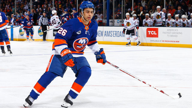 UNIONDALE, NY - JANUARY 03: Joshua Ho-Sang #26 of the New York Islanders skates agaknst the Chicago Blackhawks at Nassau Veterans Memorial Coliseum on January 3, 2019 in Uniondale, New York. New York Islanders defeated the Chicago Blackhawks 4-3 in overtime.