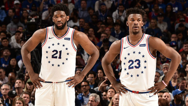 PHILADELPHIA, PA - MAY 9: Joel Embiid #21 and Jimmy Butler #23 of the Philadelphia 76ers look on against the Toronto Raptors during Game Six of the Eastern Conference Semifinals of the 2019 NBA Playoffs on May 9, 2019 at the Wells Fargo Center in Philadelphia, Pennsylvania. NOTE TO USER: User expressly acknowledges and agrees that, by downloading and/or using this photograph, user is consenting to the terms and conditions of the Getty Images License Agreement. Mandatory Copyright Notice: Copyright 2019 NBAE