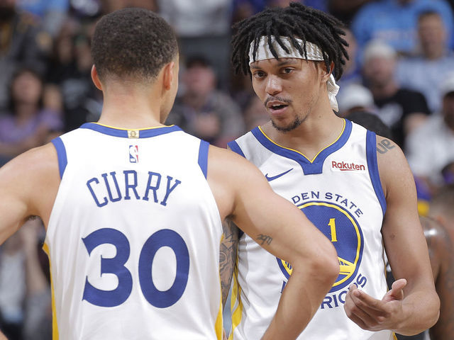 SACRAMENTO, CA - DECEMBER 14: Damion Lee #1 and Stephen Curry #30 of the Golden State Warriors talk during the game against the Sacramento Kings on December 14, 2018 at Golden 1 Center in Sacramento, California. NOTE TO USER: User expressly acknowledges and agrees that, by downloading and or using this photograph, User is consenting to the terms and conditions of the Getty Images Agreement. Mandatory Copyright Notice: Copyright 2018 NBAE