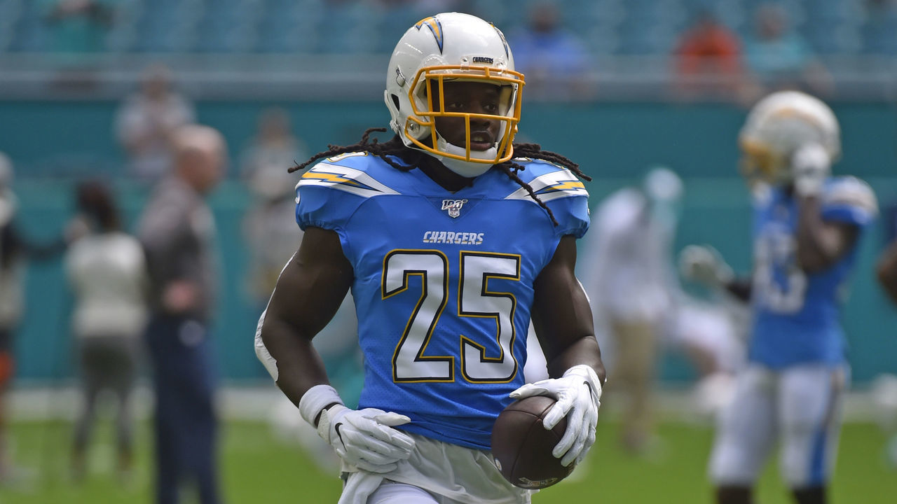 MIAMI, FL - SEPTEMBER 29: Melvin Gordon #25 of the Los Angeles Chargers in action during pregame before the start of the game against the Miami Dolphins at Hard Rock Stadium on September 29, 2019 in Miami, Florida.
